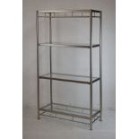 Metal framed four tier display unit having glass shelves Condition: