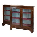 Pair of early 20th Century oak and mahogany cabinet bookcases, each fitted three shelves enclosed by