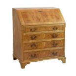 Reproduction yew wood finish bureau fitted fall flap with four long drawers below and standing on