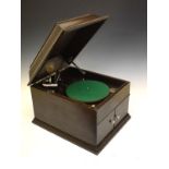 Vintage H.M.V. oak cased table top wind-up gramophone with a small quantity of 78rpm records