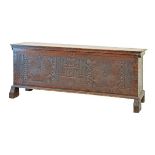 18th Century carved pine coffer, possibly Eastern Mediterranean, the front panel decorated with