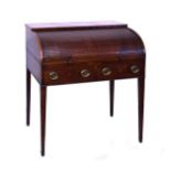 George III mahogany cylinder front desk having a tambour shutter opening to reveal a fitted