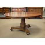 19th Century crossbanded mahogany circular snap top breakfast table, standing on a tapered hexagonal