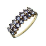 9ct gold dress ring set tanzanite and white stones, size T½ Condition: