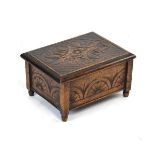 Early 20th Century rectangular stained oak carved box having felt lining and hinged cover Condition: