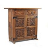Stained pine side cabinet fitted two short drawers over two blind panel doors Condition: