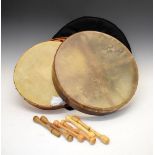 Two 20th Century hand drums/Bodhrans, cased Condition: