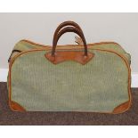 Mid 20th Century green canvas and leather holdall Condition: