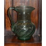 Green soda glass baluster shaped jug with etched decoration Condition: