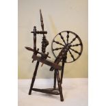 Partially early 20th Century oak and hardwood spinning wheel Condition: