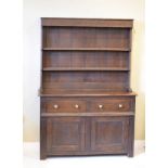 Old reproduction oak dresser, the plate rack fitted two shelves, the base fitted two drawers with