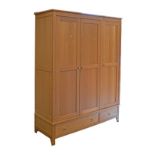 Corndell Furniture contemporary style light oak three door wardrobe fitted two drawers to the base