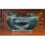 Early 20th Century Continental green iridescent glass vase having a pewter two handled frame