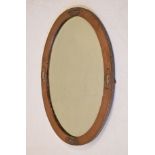 Early 20th Century copper framed oval bevelled wall mirror Condition: