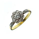 Diamond set daisy cluster ring, the shank stamped 18ct, size O½ Condition: