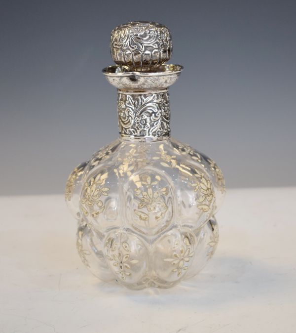 Victorian glass scent bottle having enamel foliate decoration, the enamel collar and stopper