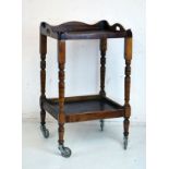 Mahogany square top two tier what-not on turned supports Condition: