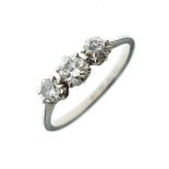 Three stone diamond ring, the white metal shank stamped 18ct Plat, size M Condition: