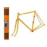 Carlton steel racing cycle frame in orange and brown with white decals, having ornate lugwork,