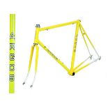 Steel racing cycle frame in yellow bearing Argos white and black decals having Campagnolo horizontal