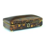 Victorian tortoiseshell veneered shaped rectangular box standing on ivory bun feet, 15.5cm long