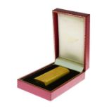 Les Must de Cartier gold plated cased gas cigarette lighter with engine turned decoration, 7cm high,