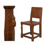 Robert 'Mouseman' Thompson of Kilburn - Oak side chair having a leather seat and back, the leg