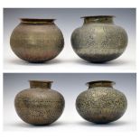 Three Indian heavy bronze lota vessels, probably 19th Century, each having allover foliate