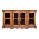 19th Century figured walnut breakfront cabinet bookcase, fitted glazed doors each with decorative