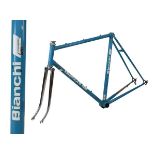 Bianchi steel racing cycle frame in turquoise with white decals and having chrome forks, having