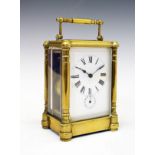 Early 19th Century French brass cased carriage clock, having an alarm movement, the white enamel
