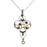 Edwardian design pendant set seed pearl and pale green stone on a 9ct gold chain Condition: