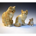 Three Winstanley figures of ginger tabby cats, 11.5cm - 28cm high Condition: