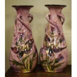 Pair of Lemon & Crute Torquay pottery baluster shaped vases, each decorated with birds amongst