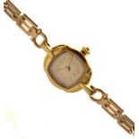 Lady's cocktail watch, the case stamped 18k on a 9ct gold gate link bracelet, quartz movement