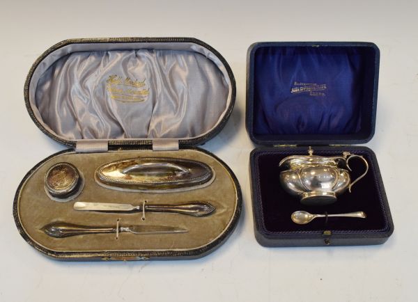 Silver mounted four piece manicure set, cased and a silver mustard and spoon with blue glass