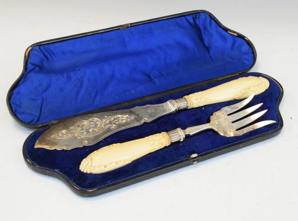 Pair of late 19th/early 20th Century engraved silver plated fish servers having carved ivory