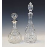 George V cut glass bottle shaped decanter with silver collar and blown glass stopper, London 1924,