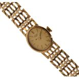 Lady's Rotary 9ct gold cased wristwatch having gate link bracelet Condition: