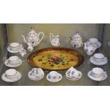 Late 19th/early 20th Century dolls tea service having painted floral decoration, together with an