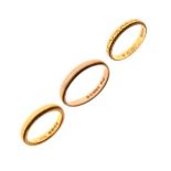 Two 22ct gold wedding bands and one other 9ct gold similar Condition: