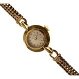 Lady's Girard-Perregaux 9ct gold cased cocktail watch with conforming bracelet, cased Condition: