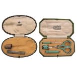 Harrods of London early 20th Century silver and green turquoise enamel decorated travel sewing kit