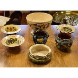 Aller Vale Devon Ware bowl standing on a circular foot, three pieces of Devon mottoware and three