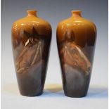 Pair of early 20th Century vases, each having transfer printed decoration depicting a horse's head