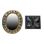 Swedish pottery oval framed wall mirror, together with a similar Butterfly wall plaque Condition: