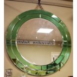 Art Deco circular mirror having green mirror glass border, 71cm diameter Condition: