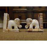 Pair of alabaster figural bookends decorated with elephants Condition: