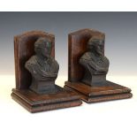 Pair of early 20th Century bronzed spelter and oak figural bookends, each formed as a bust of