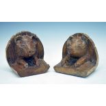 Pair of carved wood bookends formed as pigs Condition: